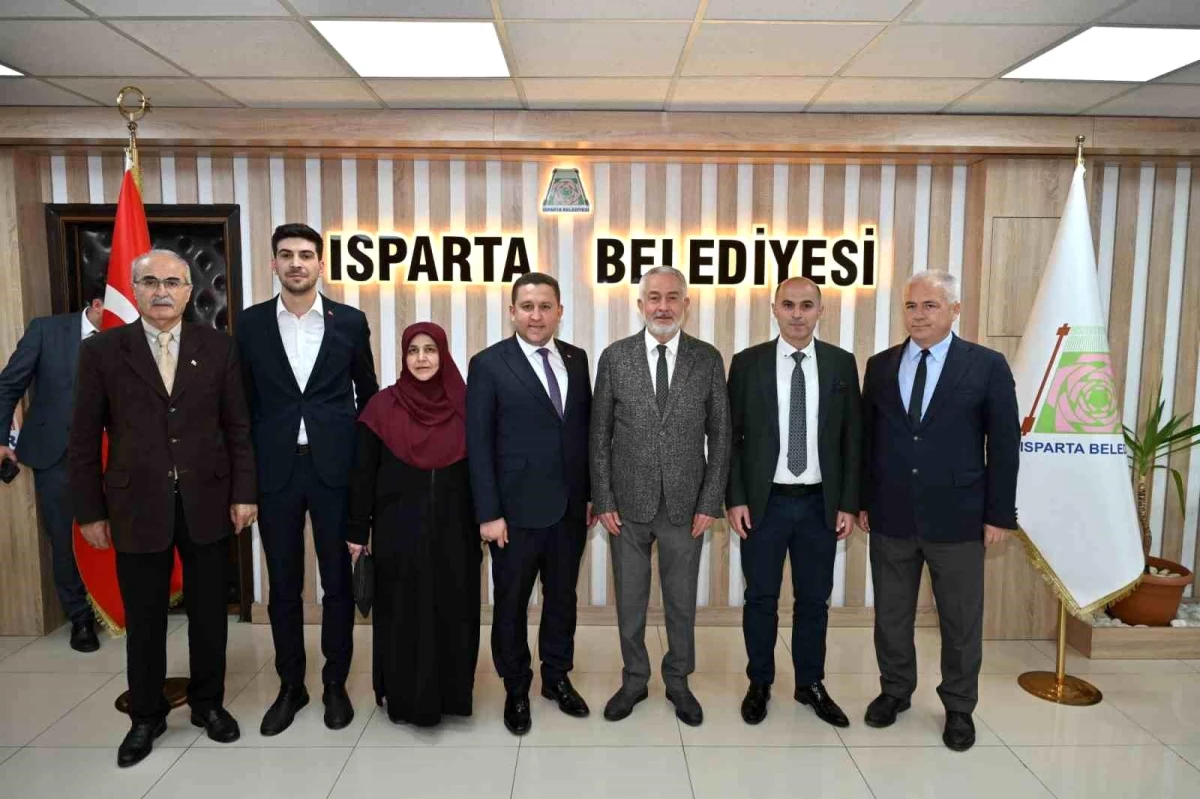 Isparta İl Genel Meclisi Başkanı Mehmet Ali Ertuğrul ve üyeleri Belediye Başkanı Şükrü Başdeğirmen’i ziyaret etti